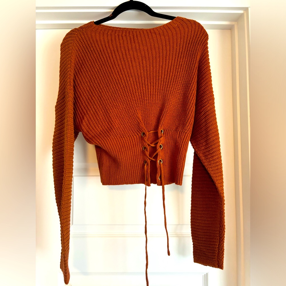 New with tags say what sweater size large